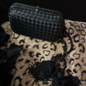 Elegant Black Woven Clutch with Tassels
